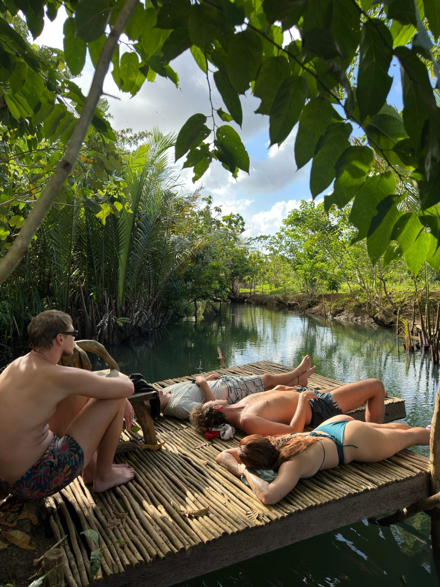 Relaxing on the river platform at the farm, Juan & Lonely